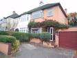 An extended three bedroom semi detached house with attached garage which has